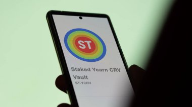 April 20th 2024 , Shanghai, China. Close up on logo of (ST-YCRV) Staked Yearn CRV Vault on the screen of an exchange. (ST-YCRV) Staked Yearn CRV Vault price stocks, $ST-YCRV on a device. clipart