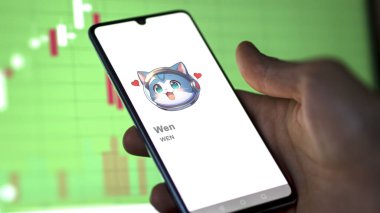 20 Nisan 2024, Şangay, Çin. Bir değiş tokuş ekranında WEN (WEN) logosunu kapat. (WEN) Fiyat hisseleri, bir aygıt WEN $.