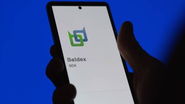 Bir takas ekranında Beldex (BDX) logosunu kapat. (BDX) Beldex fiyat hisseleri, bir aygıt üzerinde $BDX.