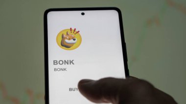 Değiş tokuş ekranındaki BONK logosunu kapat. BONK Fiyat Hisseleri, Bir aygıt için BONK $.