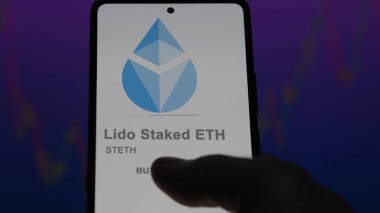 Close up on logo of (STETH) Lido Staked ETH on the screen of an exchange. (STETH) Lido Staked ETH price stocks, $STETH on a device. clipart