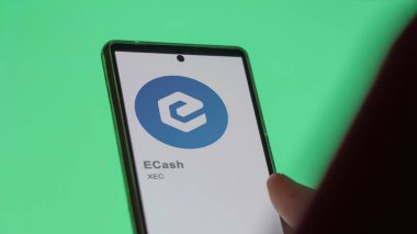 Bir takas ekranında (XEC) eCash logosuna yaklaş. (XEC) eCash fiyat hisseleri, cihaza XEC $.