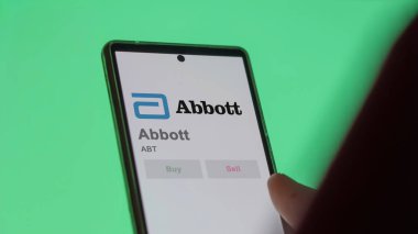 29 Nisan 2024, Kuzey Chicago, Illinois. Değiş tokuş ekranındaki Abbott logosuna yaklaş. Abbott hisse senetleri, ABT $'lık cihaz..
