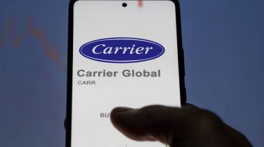 April 09th 2024 , Palm Beach Gardens, Florida. Close up on logo of Carrier Global on the screen of an exchange. Carrier Global price stocks, $CARR on a device. clipart