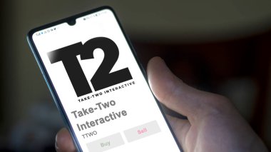 09 Nisan 2024, New York, New York. Takas ekranındaki Take-Two Interactive logosuna yaklaş. Al-İki Etkileşimli Fiyat Hisseleri, Bir aygıt için TTWO $.