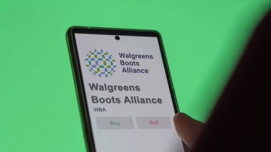 29 Nisan 2024, Deerfield, Illinois. Takas ekranında Walgreens Boots Alliance 'ın logosuna yaklaş. Walgreens Boots Alliance hisse senetleri, bir cihaza WBA $.