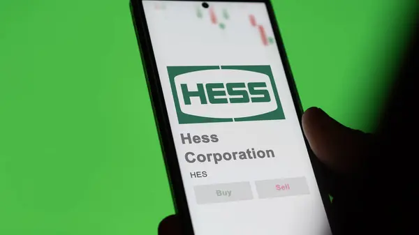 stock image April 09th 2024 , New York City, New York. Close up on logo of Hess Corporation on the screen of an exchange. Hess Corporation price stocks, $HES on a device.