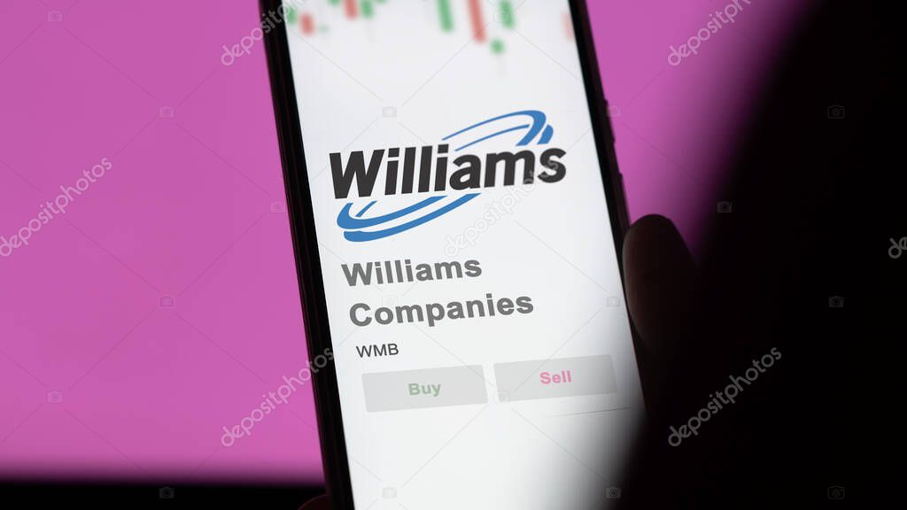 April 09th 2024 , Tulsa, Oklahoma. Close up on logo of Williams Companies on the screen of an exchange. Williams Companies price stocks, $WMB on a device.