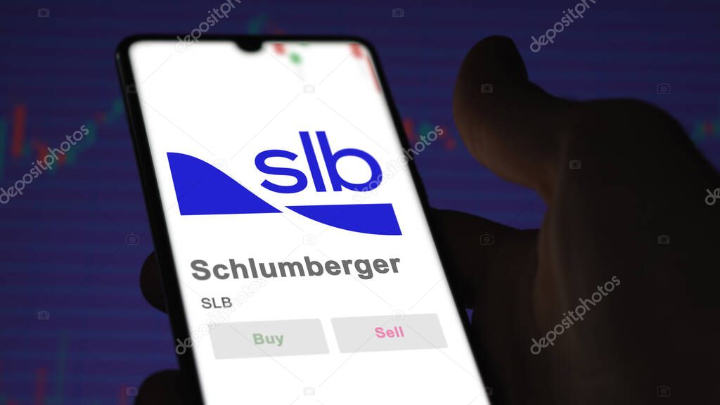 April 09th 2024 , Houston, Texas. Close up on logo of Schlumberger on the screen of an exchange. Schlumberger price stocks, $SLB on a device.