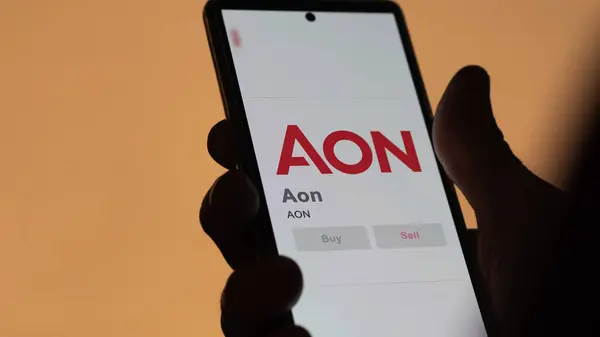 stock image April 09th 2024 , London, UK. Close up on logo of Aon on the screen of an exchange. Aon price stocks, $AON on a device.