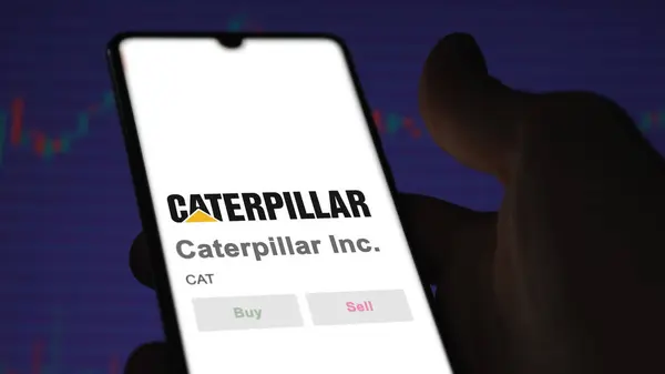 stock image April 09th 2024 , Irving, Texas. Close up on logo of Caterpillar Inc. on the screen of an exchange. Caterpillar Inc  price stocks, $CAT on a device.