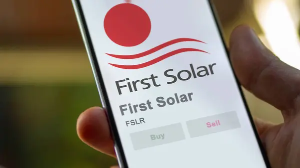 stock image April 09th 2024 , Tempe, Arizona. Close up on logo of First Solar on the screen of an exchange. First Solar price stocks, $FSLR on a device.