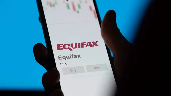 stock image April 09th 2024 , Atlanta, Georgia. Close up on logo of Equifax on the screen of an exchange. Equifax price stocks, $EFX on a device.