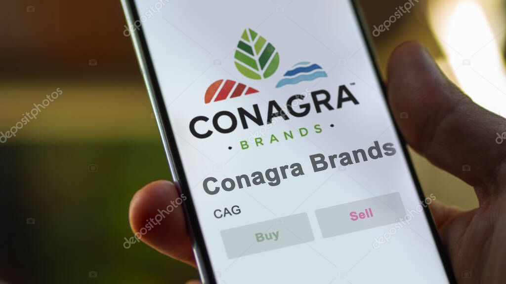 April 09th 2024 , Chicago, Illinois. Close up on logo of Conagra Brands on the screen of an exchange. Conagra Brands price stocks, $CAG on a device.
