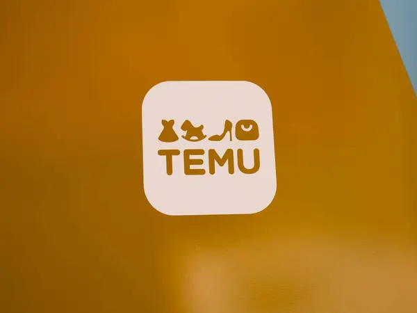 stock image May 31th 2024. Logo of Temu on a large orange sticker.