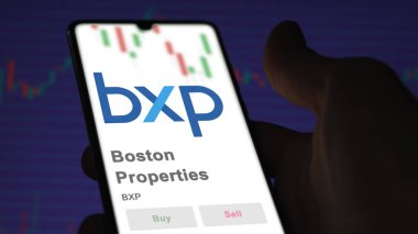 April 09th 2024 , Boston, Massachusetts. Close up on logo of Boston Properties on the screen of an exchange. Boston Properties price stocks, $BXP on a device. clipart