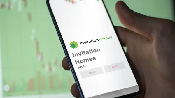 stock image April 09th 2024 , Dallas, Texas. Close up on logo of Invitation Homes on the screen of an exchange. Invitation Homes price stocks, $INVH on a device.