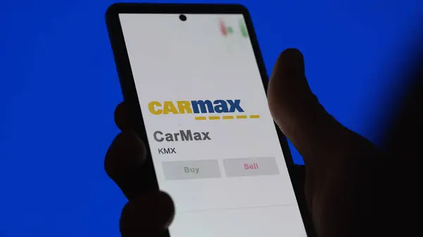 stock image April 09th 2024 , Richmond, Virginia. Close up on logo of CarMax on the screen of an exchange. CarMax price stocks, $KMX on a device.