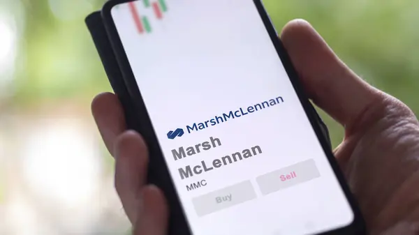 Stock image April 09th 2024 , New York City, New York. Close up on logo of Marsh McLennan on the screen of an exchange. Marsh McLennan price stocks, $MMC on a device.