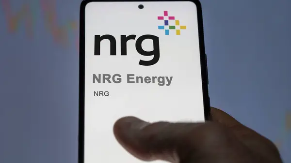 stock image April 09th 2024 , Houston, Texas. Close up on logo of NRG Energy on the screen of an exchange. NRG Energy price stocks, $NRG on a device.