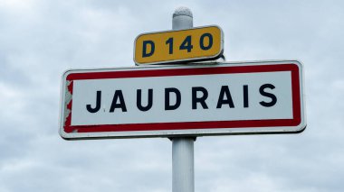 Jaudrais, Fransız kasaba tabelası..