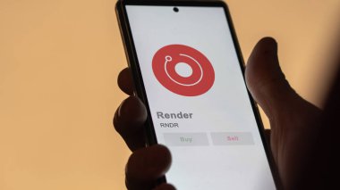 Değiş tokuş ekranındaki RNDR Render logosuna yaklaş. RNDR Render hisse senetleri, RNDR $bir aygıt üzerinde.