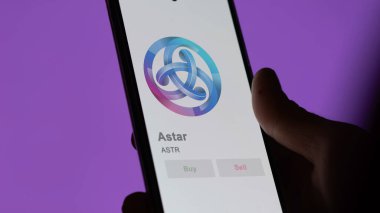 Değiş tokuş ekranındaki ASTR Astar logosuna yaklaş. ASTR Astar hisse senetleri, bir cihaza ASTR $.