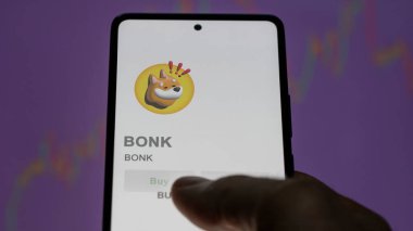 Takas ekranındaki BONK BONK logosuna yaklaş. BONK BONK fiyat hisseleri, bir aygıt BONK $.