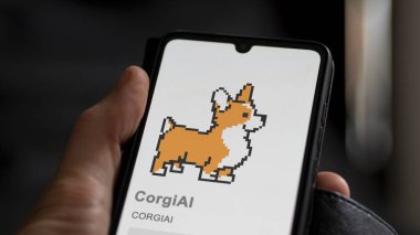 Değiş tokuş ekranındaki CORGIAI CorgiAI logosuna yaklaş. CORGIAI CorgiAI hisse senetleri, CORGIAI $on a device.