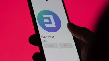 Bir değiş tokuş ekranındaki DEL Ondalık logosuna yaklaş. DEL Ondalık Fiyat hisseleri, bir aygıt üzerinde DEL $.