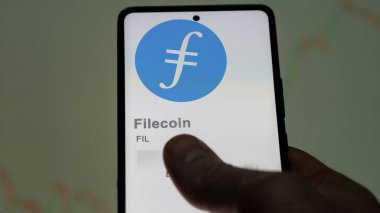 Değiş tokuş ekranındaki FIL dosya parasının logosuna yaklaş. Dosya dosyasının fiyat hisseleri, aygıtın üzerindeki FIL $.