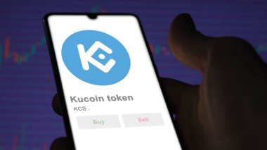 Takas ekranındaki KCS kucoin logosunu kapat. KCS kucoin marka marka hisse senetleri, bir aygıtta $KCS.