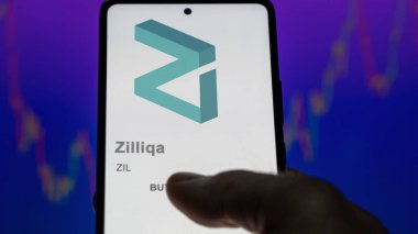 Close up on logo of ZIL Zilliqa on the screen of an exchange. ZIL Zilliqa price stocks, $ZIL on a device. clipart