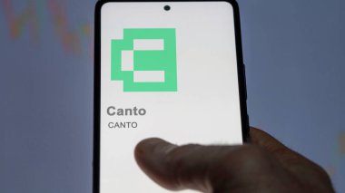 Değiş tokuş ekranındaki CANTO kantosunun logosuna yaklaş. CANTO hisse senedi fiyatları, CANTO $on a device.
