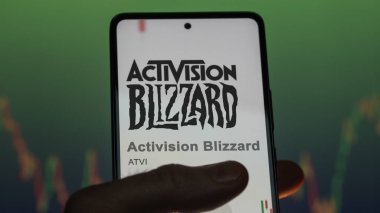 April 09th 2024 , Santa Monica, California. Close up on logo of Activision Blizzard on the screen of an exchange. Activision Blizzard price stocks, $ATVI on a device. clipart