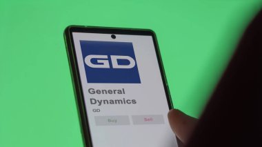 29 Nisan 2024, Falls Church, Virginia. General Dynamics 'in logosuna bir değiş tokuş ekranında yaklaş. General Dynamics hisse senetleri, bir cihaza GD $.