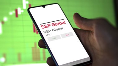 April 09th 2024 , New York City, New York. Close up on logo of S&P Global on the screen of an exchange. S&P Global price stocks, $SPGI on a device. clipart