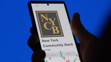 March 26th 2024, logo of New York Community Bank on a white wall in a hall building, the $NYCB brand indoor. clipart