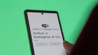 Rolling Meadows, Illinois. Bir değiş tokuş ekranında Arthur J. Gallagher & Co. 'nun logosuna yaklaş. Arthur J Gallagher & Ortak Fiyat Hisseleri, AJG $bir aygıt üzerinde.