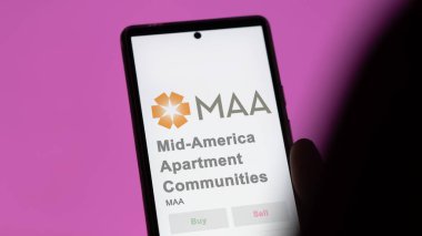 Memphis, Tennessee. Orta Amerika Apartman Toplulukları 'nın logosunu bir değiş tokuş ekranında kapatın. Orta-Amerika Apartman Toplulukları hisse senetleri, bir cihaza MAA $.