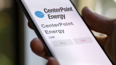 Houston, Teksas. Merkez Noktası Enerjisi 'nin logosuna yakın çekim yap. Merkez Noktası Enerji Fiyat Hisseleri, Bir aygıta CNP $.