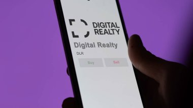 Austin, Teksas. Değiş tokuş ekranındaki Dijital Gayrimenkul logosuna yaklaş. Dijital Emlak Fiyat Hisseleri, Bir aygıt için DLR $.