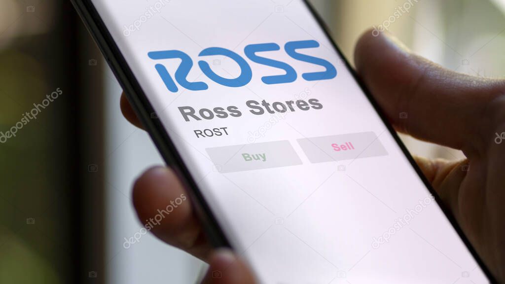 Dublin, California. Close up on logo of Ross Stores on the screen of an exchange. Ross Stores price stocks, $ROST on a device.