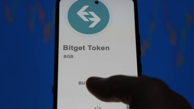 Değişim ekranındaki BGB Bitget Token şifreleme varlığının logosuna yaklaş. BGB Bitget Token hisse senetleri, bir aygıt için BGB $.