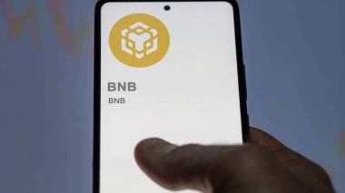 Bir değiş tokuş ekranındaki BNB şifreleme varlığının logosunu kapat. BNB BNB hisse senetleri, bir aygıt için BNB $.