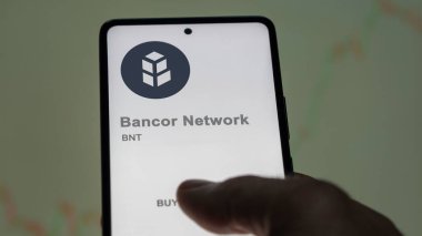 Bir değiş tokuş ekranında BNT Bancor Network şifreleme varlığının logosunu kapat. BNT Bancor Ağ Fiyat Hisseleri, Bir aygıt üzerinde BNT $.
