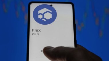 Değiş tokuş ekranındaki FLUX Flux şifreleme varlığının logosuna yaklaş. FLUX Flux fiyat hisseleri, bir aygıta FLUX $.