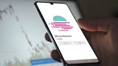 Takas ekranındaki GLMR ay ışığı kripto varlığının logosuna yaklaş. GLMR ay ışığı fiyatları hisse senetleri, GLMR $bir aygıt üzerinde.