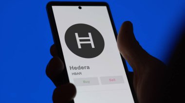 HBAR Hedera şifreleme varlığının logosunu bir takas ekranında kapat. HBAR Hedera hisse senetleri, cihaz başına $HBAR _.