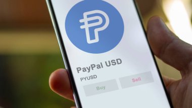 Takas ekranındaki PYUSD PayPal USD 'nin şifreleme varlığının logosunu kapat. PYUSD PayPal USD hisse senetleri, PYUSD $bir aygıt üzerinde.